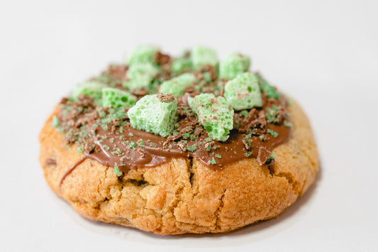 FAT Cookie: "The Full Minty" Loaded with Chewy Minty Patty & Peppermint Chocolate. Topped with Bubbly Aero & Peppermint Crisp.